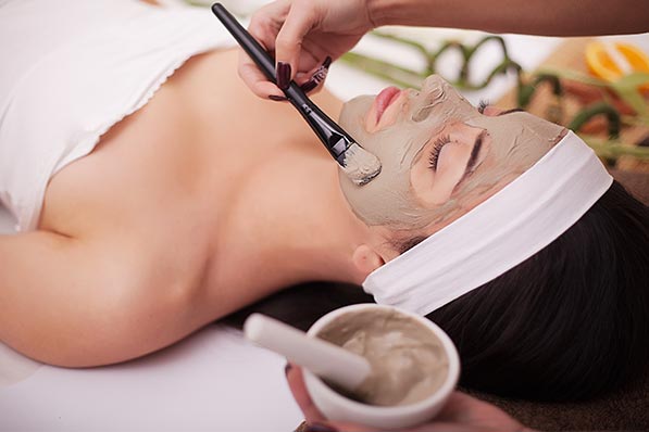 Woman receiving spa facial at Sunflower Spa