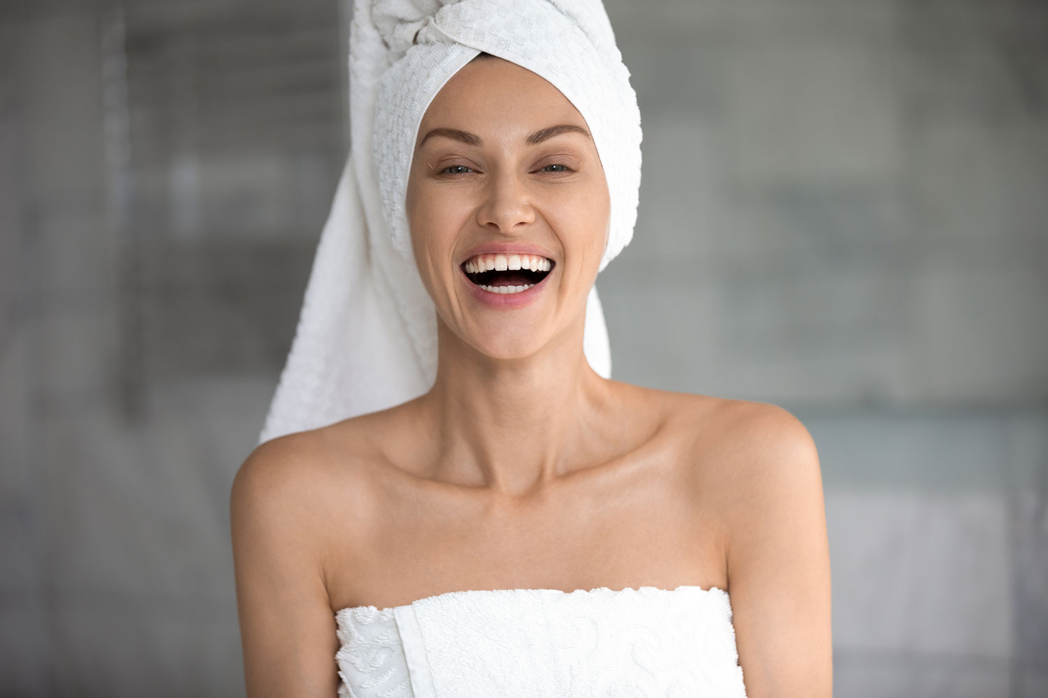 Happy woman after her facial enhancements at Sunflower Spa