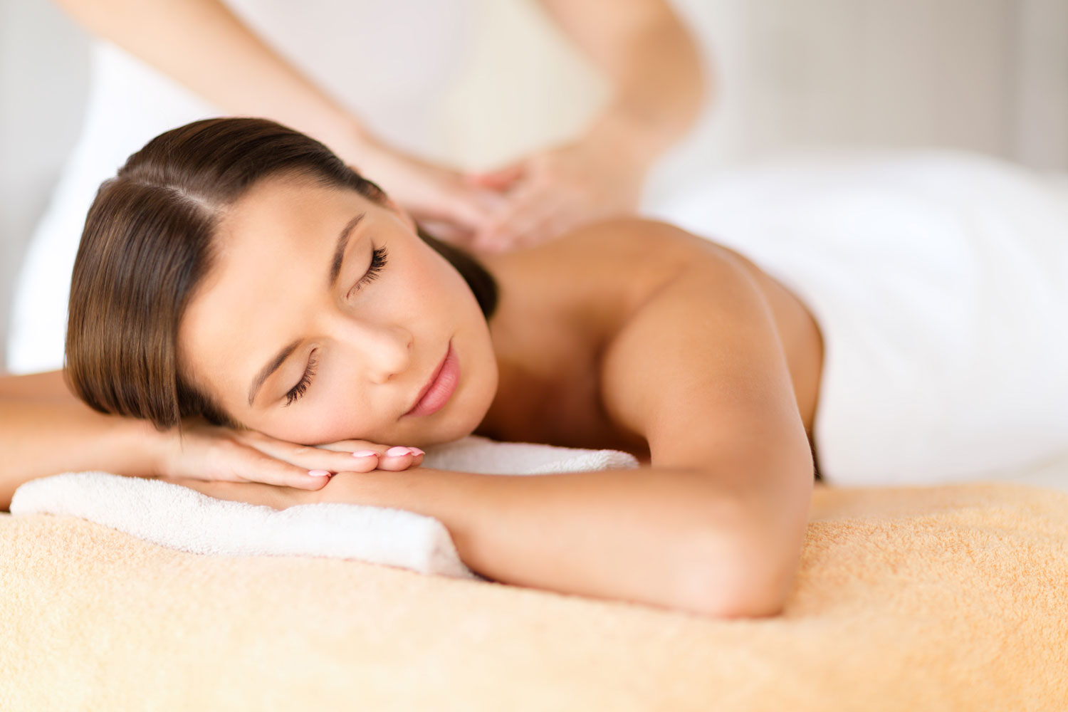 Woman having a back massage at Sunflower Spa