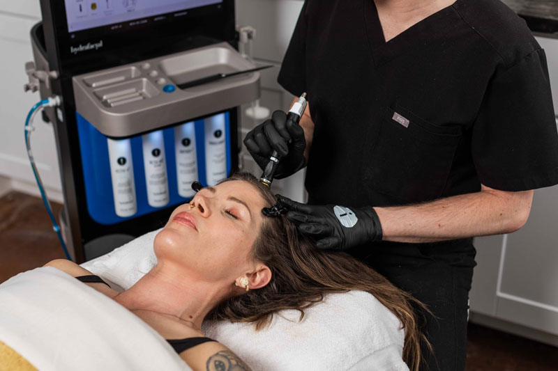 Woman having a Keravive Scalp Treatment at Sunflower Spa