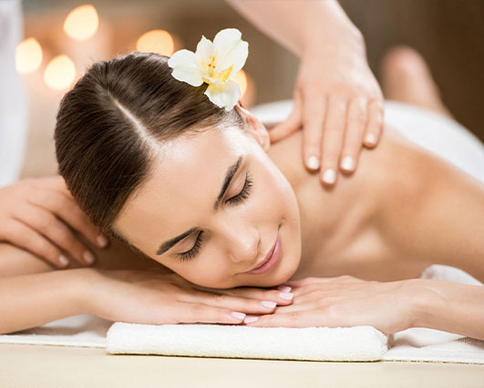 Woman having a back massage at Sunflower Spa