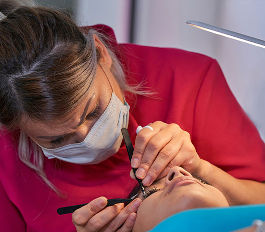 Woman having a lash extension at Sunflower Spa