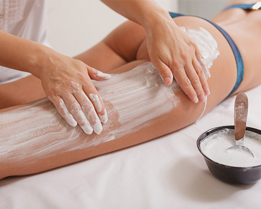 Woman receiving a full body spa mask at Sunflower Spa in Longmont, CO